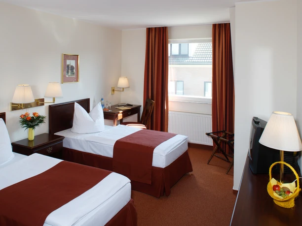 KomfortHotel Innenansicht eines Zimmers