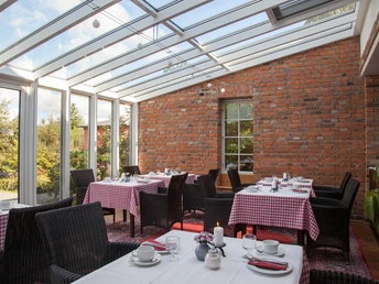 Frühstück im Wintergarten