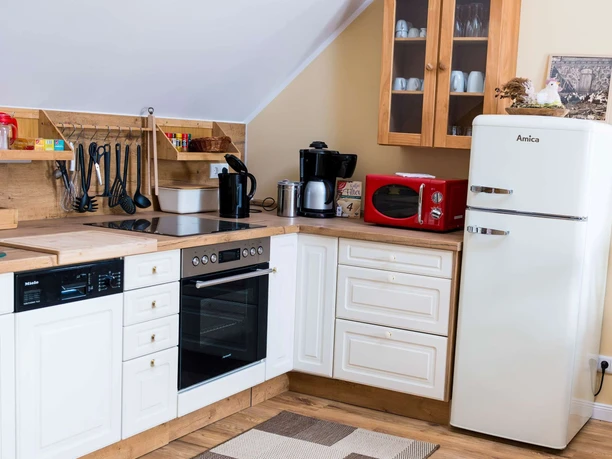 Blick in die Küche im Ferienhof am See in Alt Zeschdorf