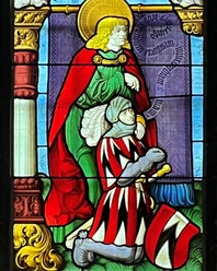Der Spiezer Freiherr Hans von Erlach (1474-1539) im Betgestus. Detail aus Scheibe der Schlosskirche Spiez