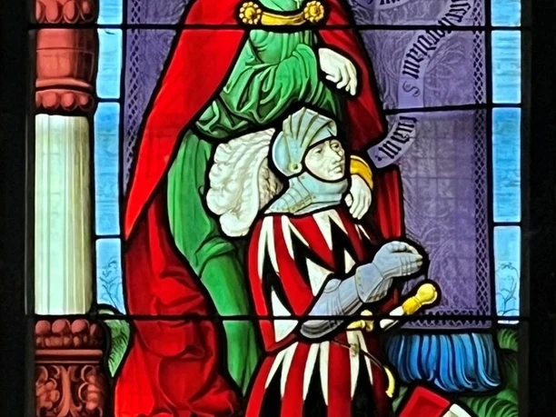 Der Spiezer Freiherr Hans von Erlach (1474-1539) im Betgestus. Detail aus Scheibe der Schlosskirche Spiez