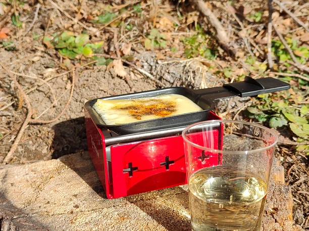 Kerzenraclette draussen an einem geschützten Ort