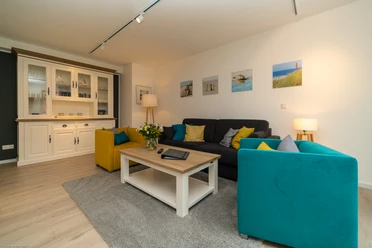 Blick ins Wohnzimmer von Ferienwohnung App. 201, inselresidenz Strandburg, Juist Blick ins Wohnzimmer von Ferienwohnung App. 201, inselresidenz Strandburg, Juist