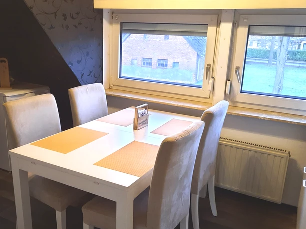 Zithoek in de keuken van de vakantiewoning Reimers