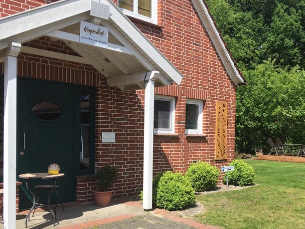 Hofseite der Ferienwohnung Hoeperhof bei Bötersen Gårdsiden af Hoeperhof-ferielejligheden nær Bötersen