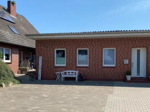 Außenansicht der Ferienwohnung Hof Ehrichs in Kuhstedt Eingangsbereich der Ferienwohnung Hof Ehrichs in Kuhstedt