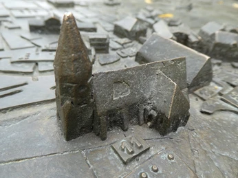 Stadtmodell Achim Bronzemodell der Stadt Achim, detailgetreu gefertigt, mit Gebäudearchitektur und Straßenverlauf.