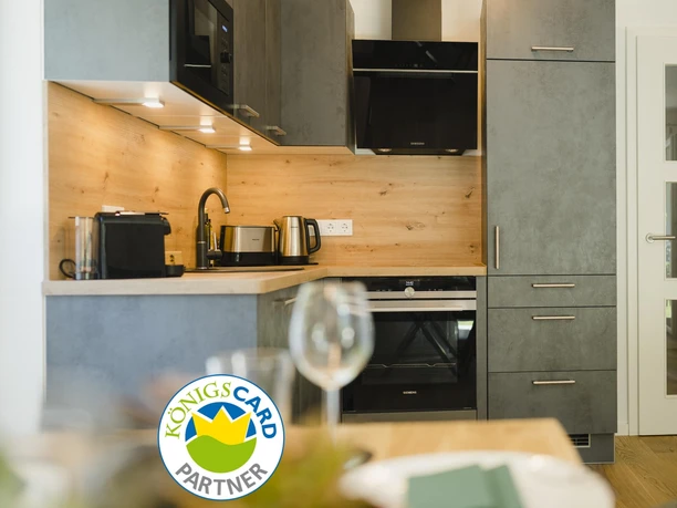 Foto mit KönigsCard_Logo