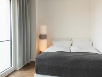 Gemütliches Bett im Appartement