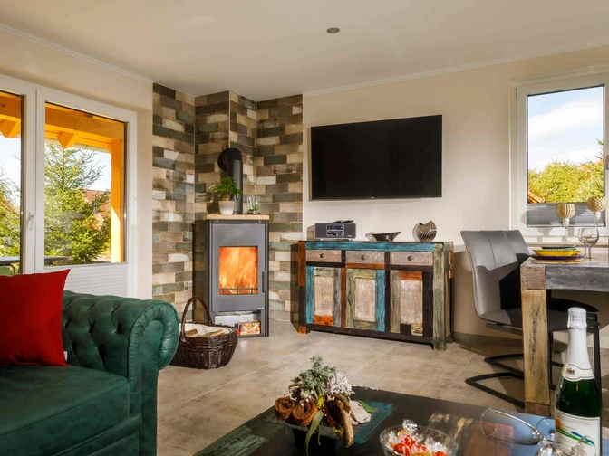 erienhäuser im Barbarossaweg Hasselfelde - Wohnbereich mit Kamin