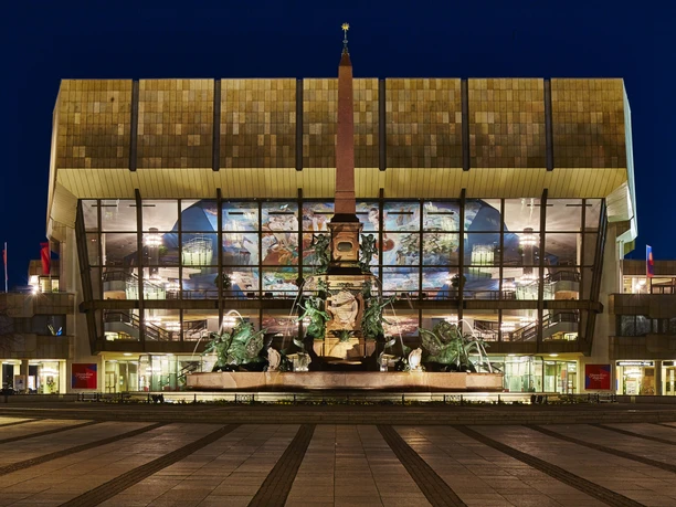 View of the Gewandhaus in Leipzig at night with the Mendebrunnen fountain in the foreground, City of Music, Sights, Culture
