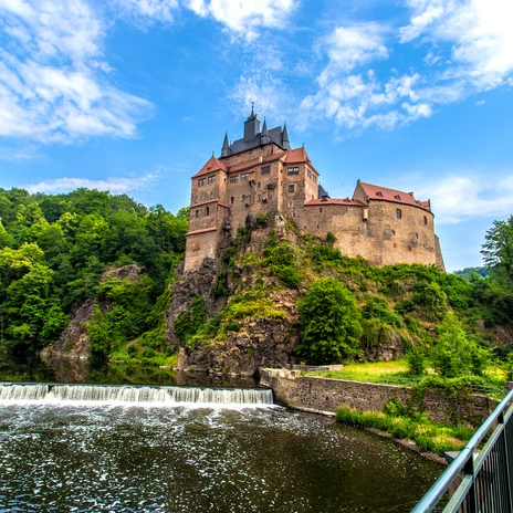 Kriebstein Castle with waterfall and bridge