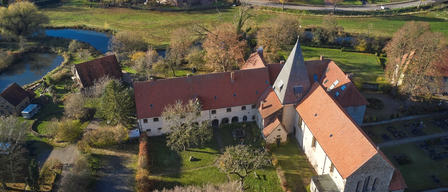 Kloster Malgarten View of Malgarten Abbey, a former Benedictine abbey with a Romanesque church and peaceful monastery grounds surrounded by greenery.