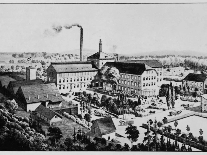 Brauerei Barre um 1900 (Bildnachweis: Stadtarchiv Lübbecke) Historische Darstellung der Brauerei Barre um 1900 mit Gebäuden, Dampfschornstein und umgebender Landschaft.