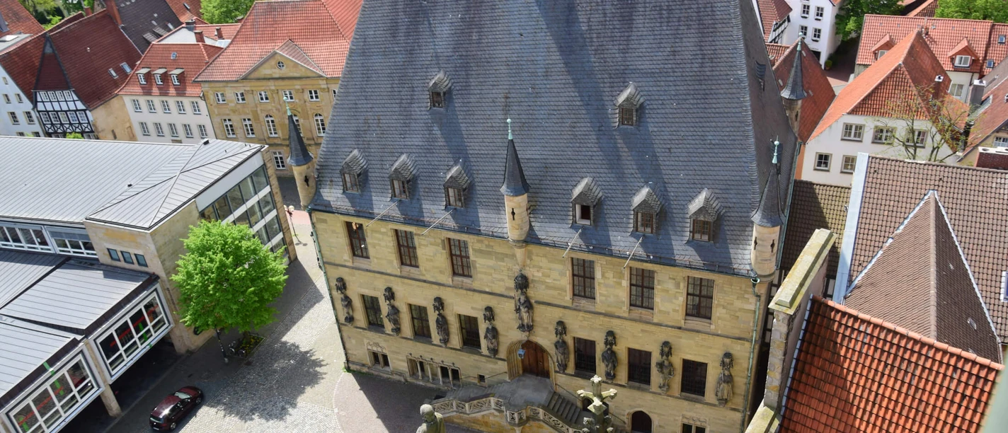 Town Hall of the Peace of Westphalia from the tower of St. Mary's Church Aerial view of the town hall of the Peace of Westphalia in Osnabrück surrounded by historic buildings.