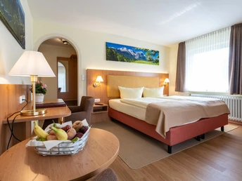 Komfort Doppelzimmer mit Bergblick und Gartenblick im Hotel Garni Brunnthaler in