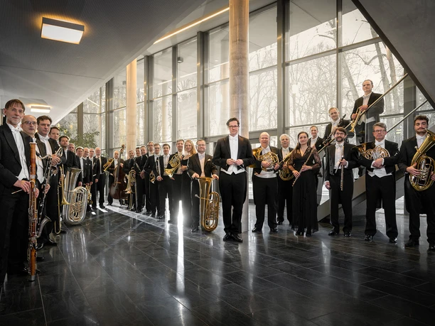 Sächsische Bläserphilharmonie avec instruments dans le foyer