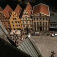 Aerial view of the EMR seen from St. Mary's Church Blick auf den Platz mit farbenfrohen Giebelhäusern und Cafétischen aus der Höhe der Marienkirche.View of the square with its colorful gabled houses and café tables from the height of St. Mary's Church.Udsigt over pladsen med dens farverige gavlhuse og caféborde fra højden af Mariakirken.Zicht op het plein met de kleurrijke gevelhuizen en cafétafels vanaf de hoogte van de St. Mary's Church.