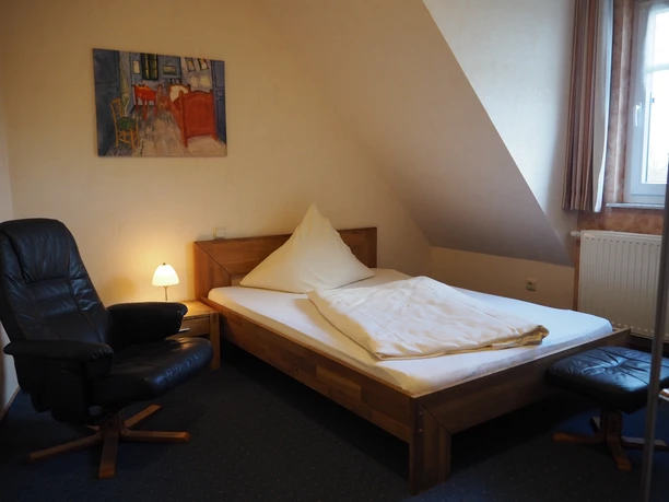 Schlafzimmer mit Einzelbett PaGa