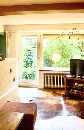 Wohnzimmer+mit+Kachelofen