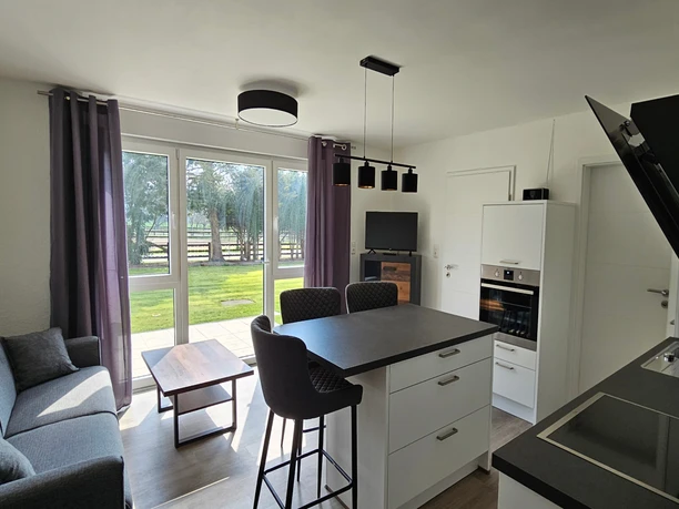 Ferienwohnung "Blick zur Weser" Wohnzimmer mit Küche Ferienwohnung "Blick zur Weser" Wohnzimmer mit Küche