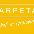 Gelbes Schild mit weißem Text "Marpetal Gasthof in Großenmarpe" ohne weitere Abbildungen.