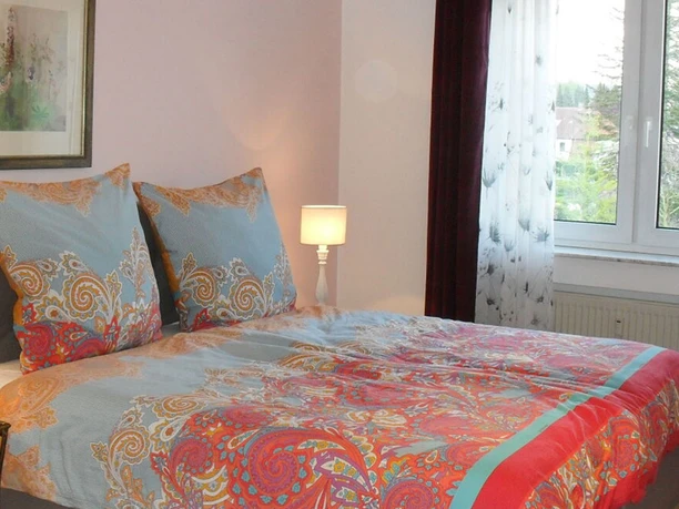 Gastgeber Ferienwohnung Living Lounge - Schlafzimmer