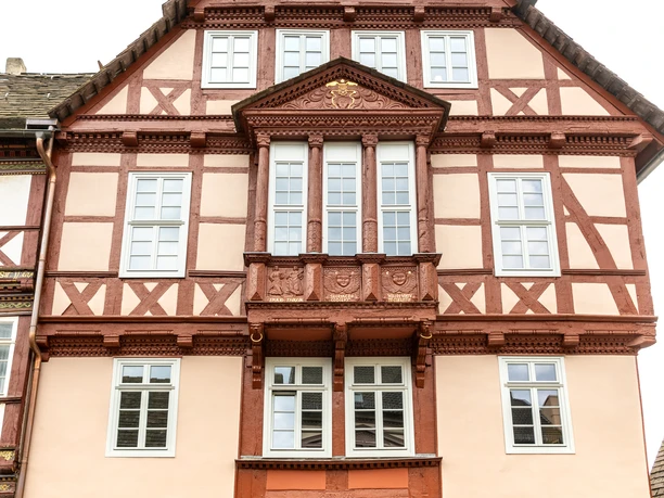 Richly decorated façade of the Tilly House