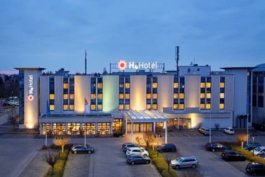 Conference hotel H4 Hotel Leipzig | Leipzig Convention Bureau Exterior view of the Conference hotel H4 Hotel Leipzig – presented by Leipzig Convention Bureau