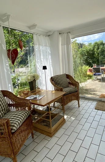 Treten Sie ein durch den Wintergarten