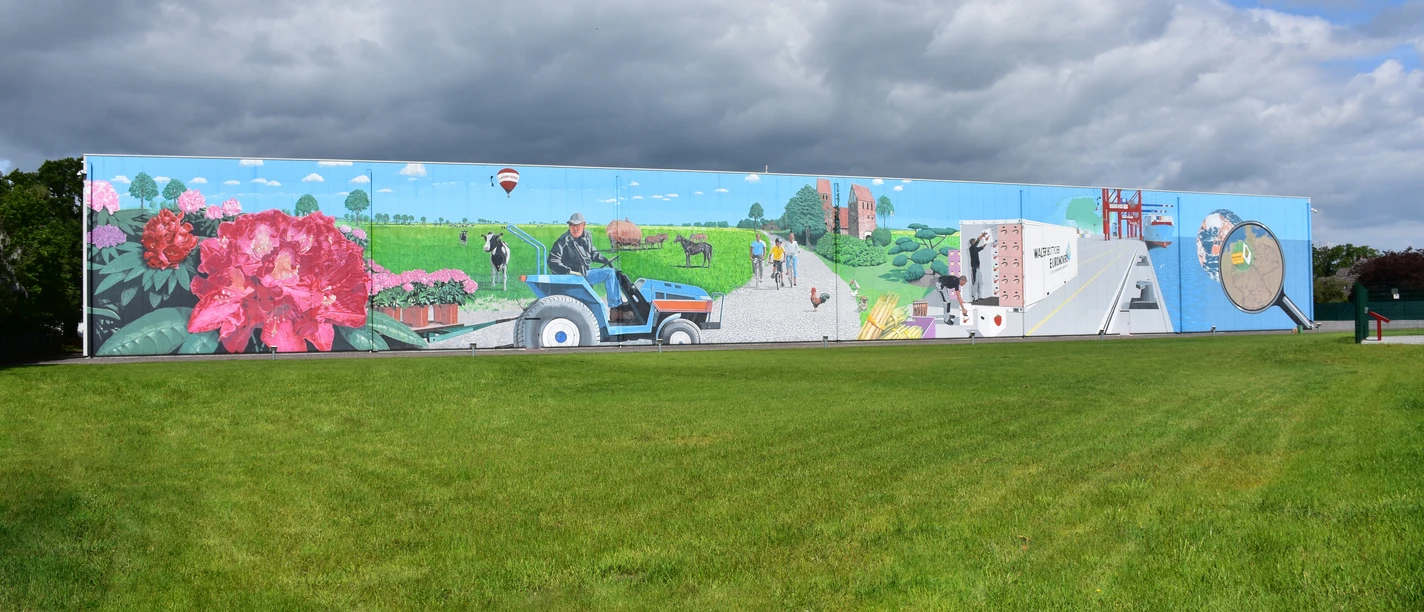 Gemälde Lager 3000 Das Bild zeigt ein Graffitigemälde an einer Hauswand des Lager 3000 in Wiefelstede