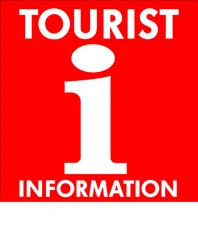 Tourist-Information Bad Lippspringe Rotes Schild mit weißem „i” für Tourist-Information, weiße Schrift auf rotem Hintergrund.
