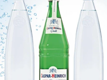 Drei Mineralwasserflaschen mit den Marken Bad Driburger Classic und Caspar-Heinrich Quelle.