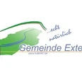 Logo der Gemeinde Extertal mit grünem Umriss, blauem Flusslauf und dem Schriftzug „echt natürlich“.