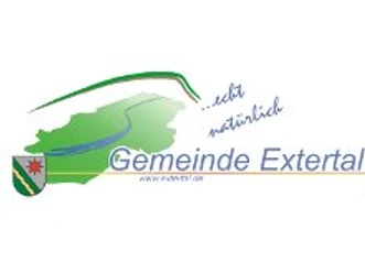 extertal Logo der Gemeinde Extertal mit grünem Umriss, blauem Flusslauf und dem Schriftzug „echt natürlich“.
