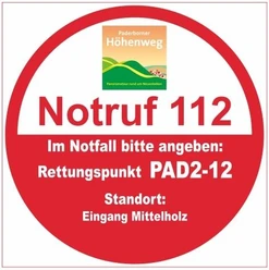 Notrufstelle PAD2-12 mit Notrufnummer 112, markiert den Eingang Mittelholz am Paderborner Höhenweg.