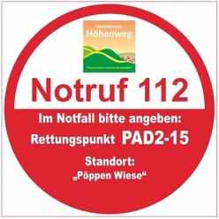 Rettungspunkt PAD2-15: "Pöppen Wiese" Notrufzeichen Rettungspunkt PAD2-15 mit Standort „Pöppen Wiese“ am Paderborner Höhenweg.