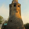 Bismarckturm in Tecklenburg Bismarckturm in Tecklenburg: Historischer Aussichtsturm aus Sandstein im warmen Licht der Abendsonne.