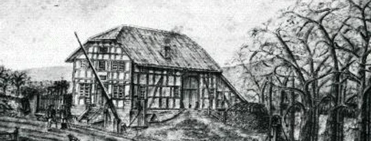 Zollhaus Fischanger um 1890 Historisches Fachwerkhaus Zollhaus Fischanger von 1890, umgeben von Bäumen, in ländlicher Umgebung.