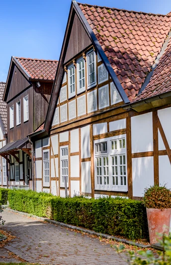 Versmold-Dorfkern Bockhorst.jpeg Fachwerkhäuser rund um die Ev. Dorfkirche in Versmold-Bockhorst