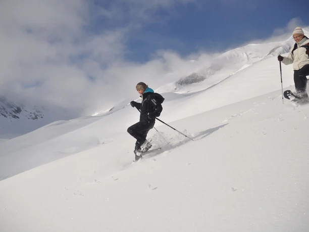 Snowshoe hike in fresh powder snow