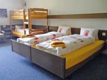 Chambre familiale à l'hôtel Kurhaus Grimmialp