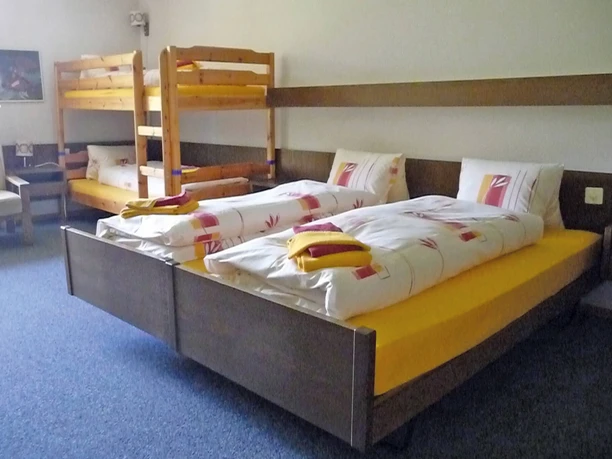 Chambre familiale à l'hôtel Kurhaus Grimmialp