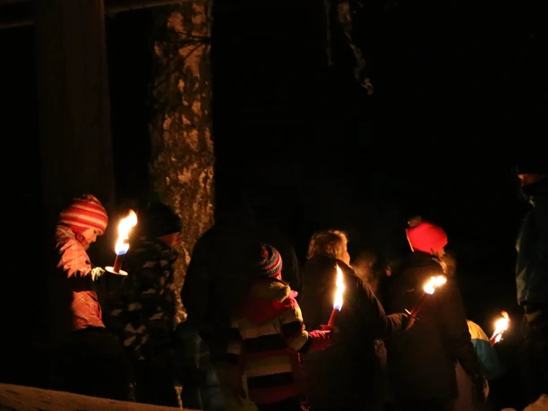 Children on a night-time torchlight walk