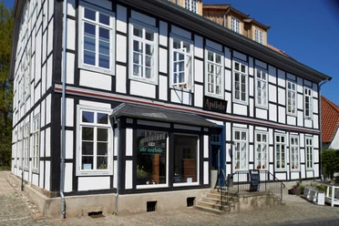 Alte Apotheke Bad Essen Het vakwerkgebouw dat het Hotel Alte Apotheke in Bad Essen herbergt
