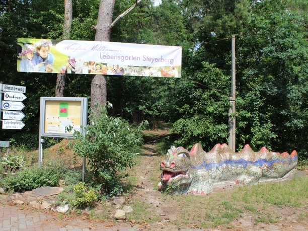 A colorful ceramic dragon greets visitors at the entrance to the Steyerberg Life Garden.