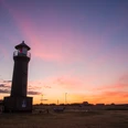 Memmertfeuer-Leuchtturm-Sonnenuntergang.jpg Vuurtoren Memmertfeuer op Juist