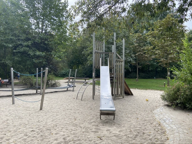 Playground surrounded by greenery in a quiet location in the Schleußig district