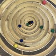 Kugelbahn im Kugelino - Der Kugelbahnspielplatz - Familienurlaub in Leipzig Spiralförmige Kugelbahn mit bunten Holzkugeln im Indoor Spielplatz Kugelino in Leipzig Lindenau.Spiral ball track with colorful wooden balls in the Kugelino indoor playground in Leipzig Lindenau.Spirálová kuličková dráha s barevnými dřevěnými kuličkami na krytém dětském hřišti Kugelino v lipském Lindenau.Spiralny tor kulkowy z kolorowymi drewnianymi kulkami na krytym placu zabaw Kugelino w Lipsk Lindenau.Spiraalvormige ballenbaan met kleurrijke houten ballen in de Kugelino binnenspeeltuin in Leipzig Lindenau.Pista di palline a spirale con palline di legno colorate nel parco giochi al coperto Kugelino di Lipsia Lindenau.