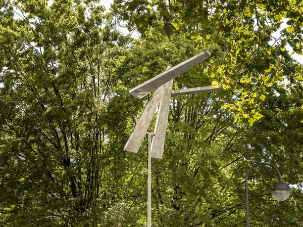 Four Trapezoids as two Rectangles IV Sculpture of four trapezoids as two rectangles in a busy, tree-lined avenue in Cologne.